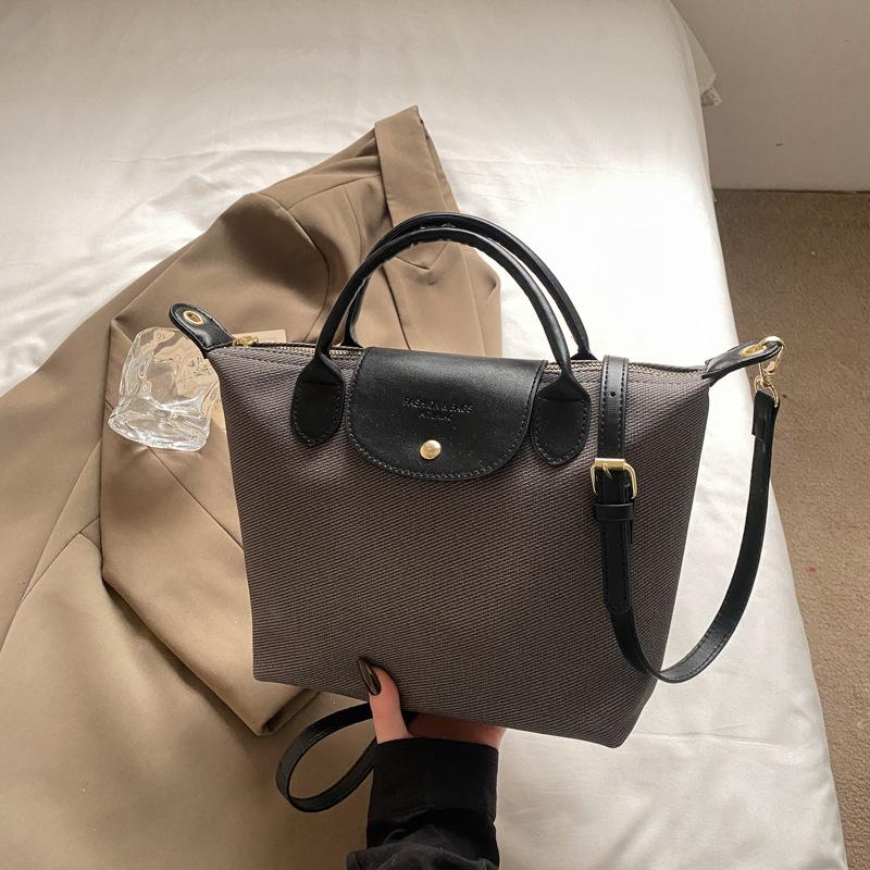 Popular niche contrasting color bag women's new high-end versatile messenger bag commuter handbag