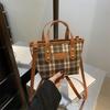 Light luxury plaid portable bucket bag women's classic niche design foreign-style texture shoulder messenger bag