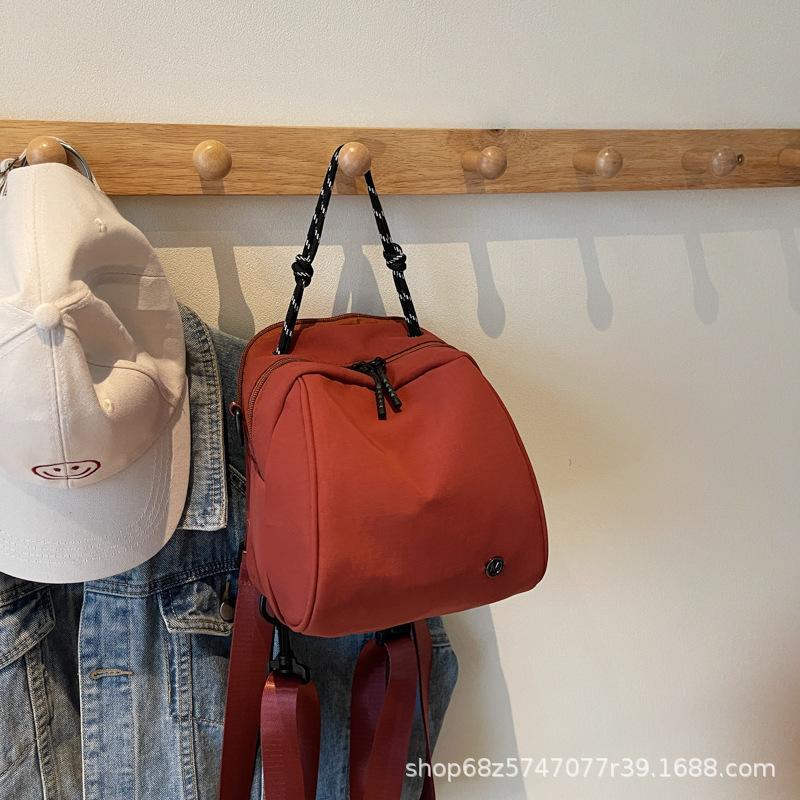 Fashion sense small backpack women's lightweight casual shoulder bag new fashion commuter shell bag simple commuter messenger bag