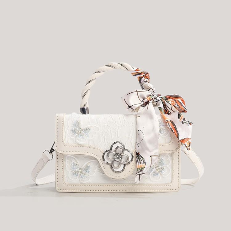 Fashionable and Versatile Small Square Bag with Unique Design, Featuring An Elegant Bow Strap Crossbody Bag.