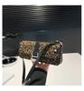 Niche leopard print underarm bag, fashionable retro high sense, commuting shoulder essential women's bag.