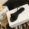 Fashion famous fabric bowtie flat sandals women black ankle strap gladiator sandalias mujer elastic band sandalias de mujer verano 2025