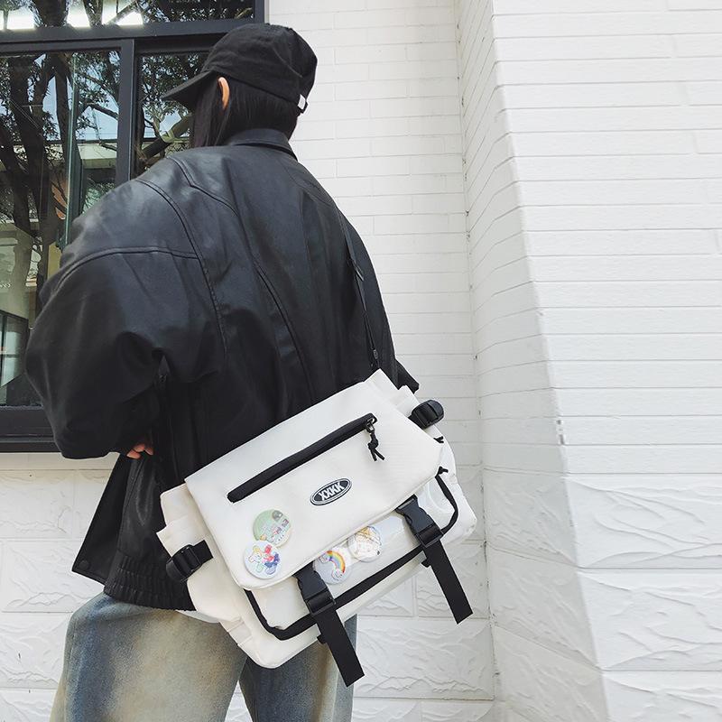 Narzędzia wszechstronne torba listonosza torba na ból studenci płci męskiej klasa plecak na ramię wersja koreańska trend duża pojemność torba damska