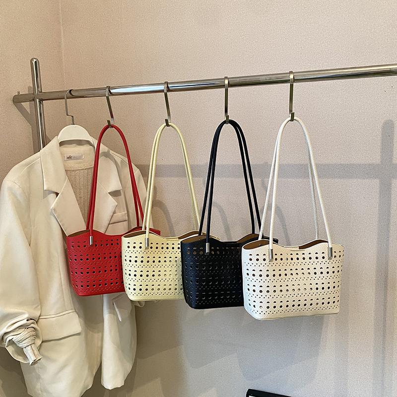 Large-capacity hollow bag women's summer versatile shoulder mother and child bag leisure work commuter tote bag
