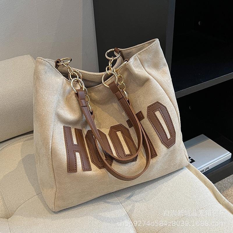 Summer fashion explosion commuter big bag women 2025 new trendy foreign style canvas bag large capacity tote bag