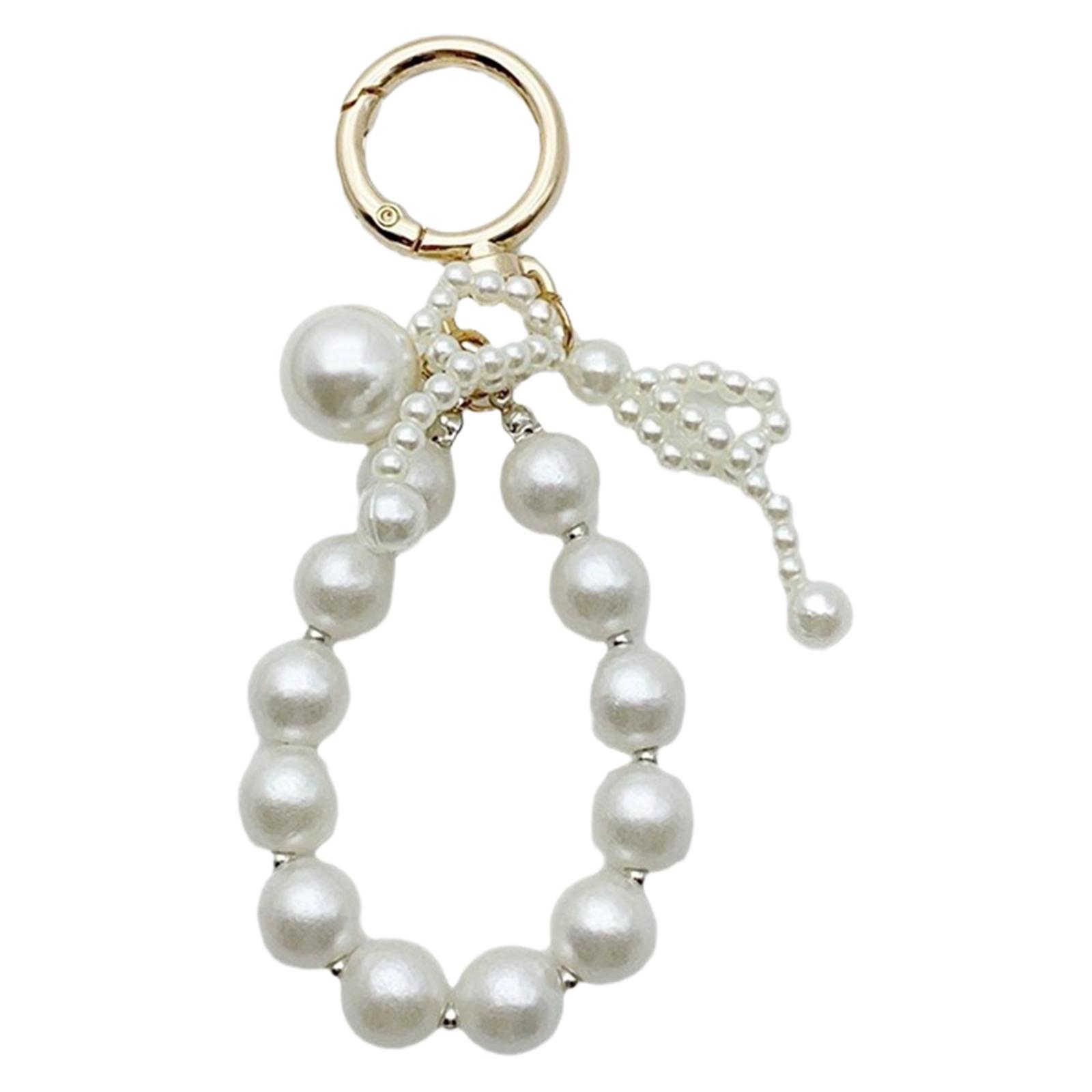 Стильный брелок-бантик с искусственным жемчугом — фото 7