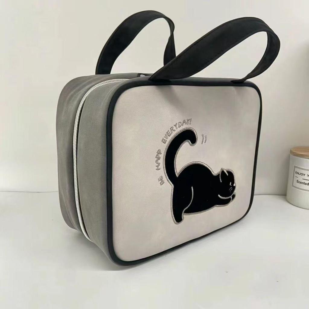 Spacious Cartoon Travel Makeup Bag: Portable, Multi-Compartment, and Three-in-One Design