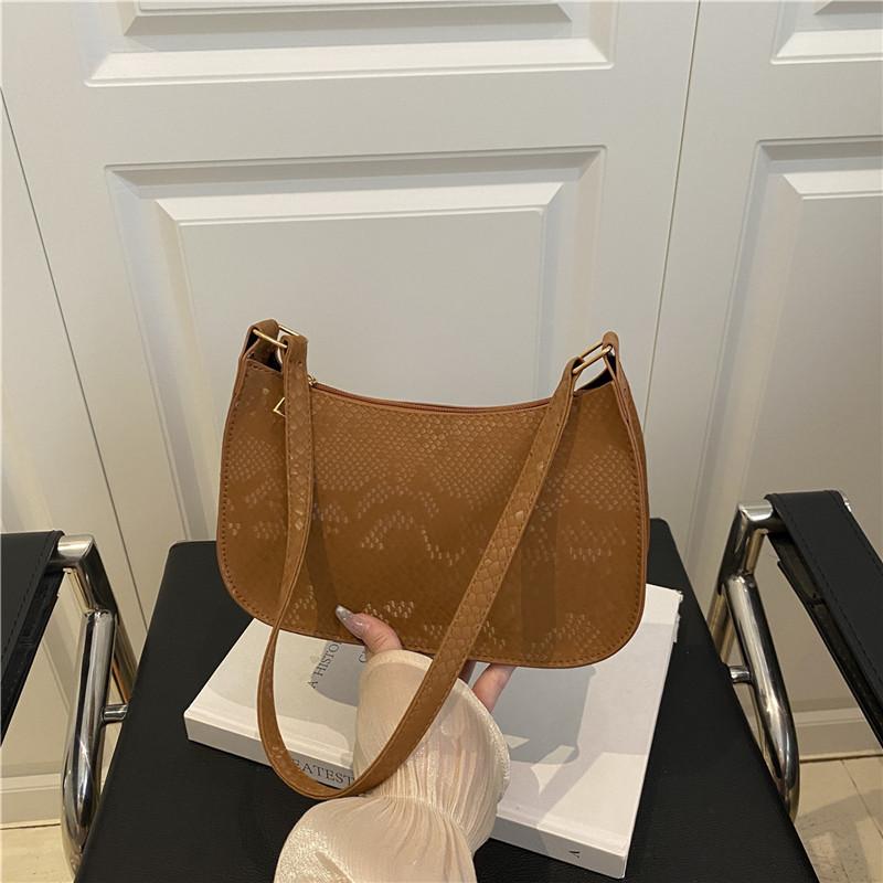 This year's popular bag women's 2025 new trendy fashion Korean version portable small square bag foreign gas snake pattern shoulder armpit bag