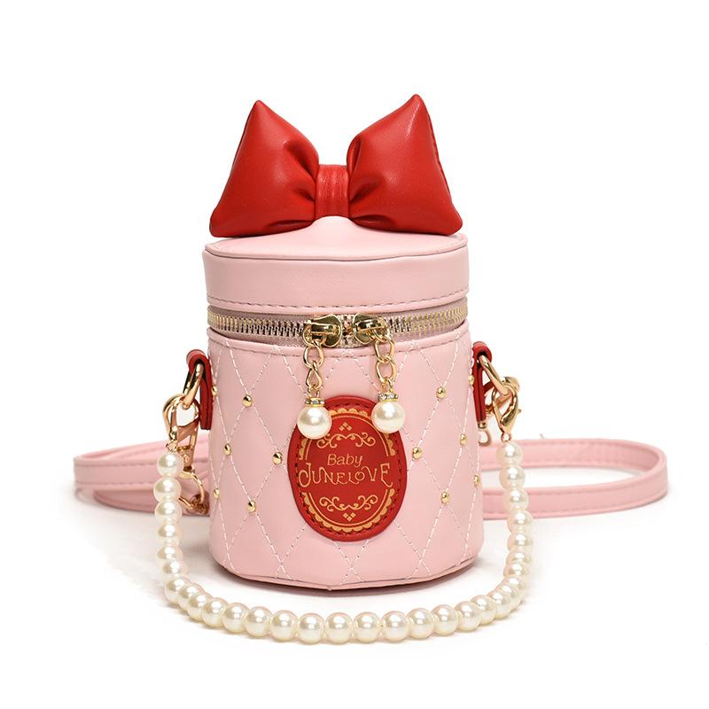Cute bow small bag 2025 new sweet girl foreign versatile pearl portable messenger cylinder bag tide
