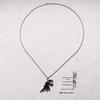 Black & White Dinosaur Pendant Oil Drip Necklace - Fade-resistant Cute Animal Sweater Chain for Couples (Unisex, Fall/Winter).