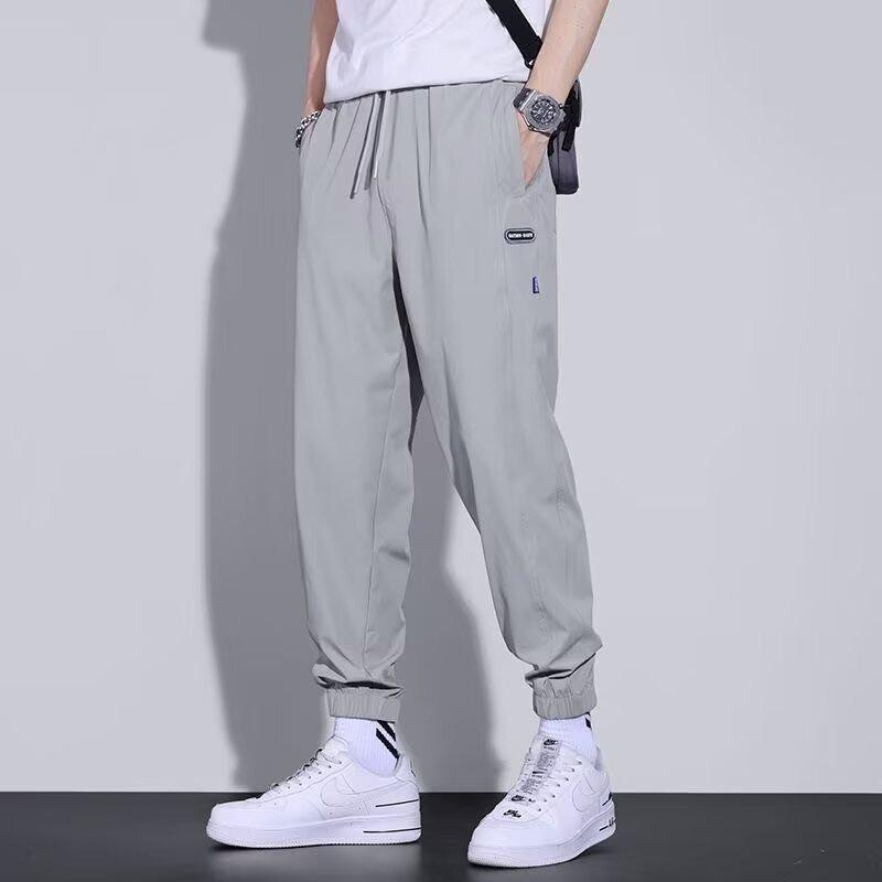 Men's casual pants elastic, loose, simple and comfortable, young students slim-fitting small feet and trousers