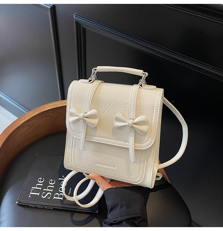 

2025 лето новый рюкзак мода повседневная сумка студенческий школьный рюкзак текстурный легкий наплечный