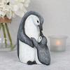 A Set of Two Resin Statues Featuring a Mother And Penguin Showcasing a Creative Family Theme These Can Serve As Decorative Pieces for Home