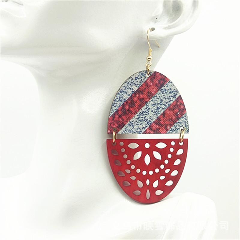 Red Hollow Spliced Creative Christmas Leather Dangle Earrings
