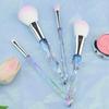 4-Piece Crystal Handle Makeup Brush Set: Eyeshadow, Foundation, Powder, Contour, and Eyebrow Brushes.