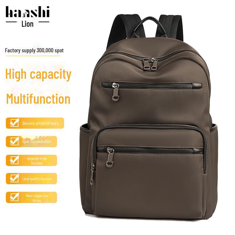 High-End Casual Waterproof Nylon Backpack: Fashionable, Lightweight Travel Bag for Men & Women, with Shoulder Straps & Laptop Compartment.