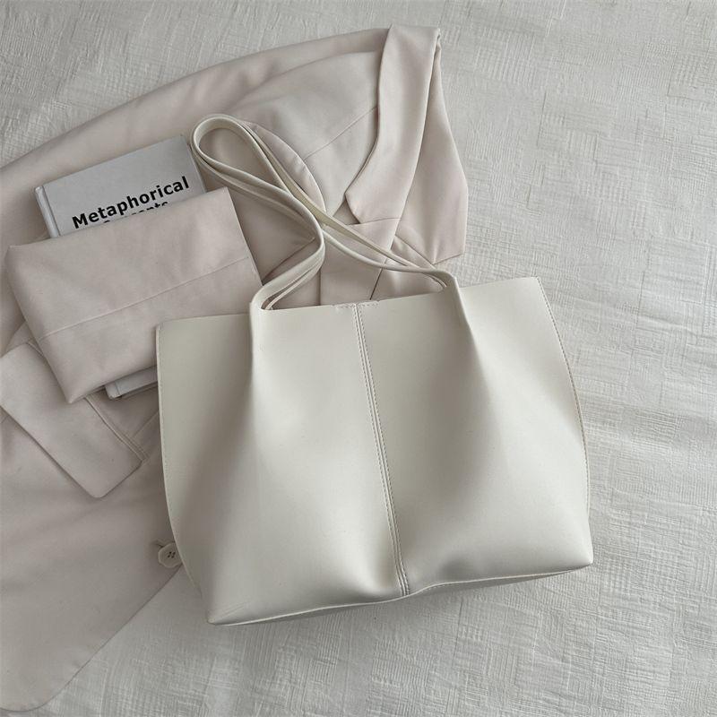 

Premium texture large-capacity bag women s new fashion versatile shoulder bag niche portable commuter tote bag білий