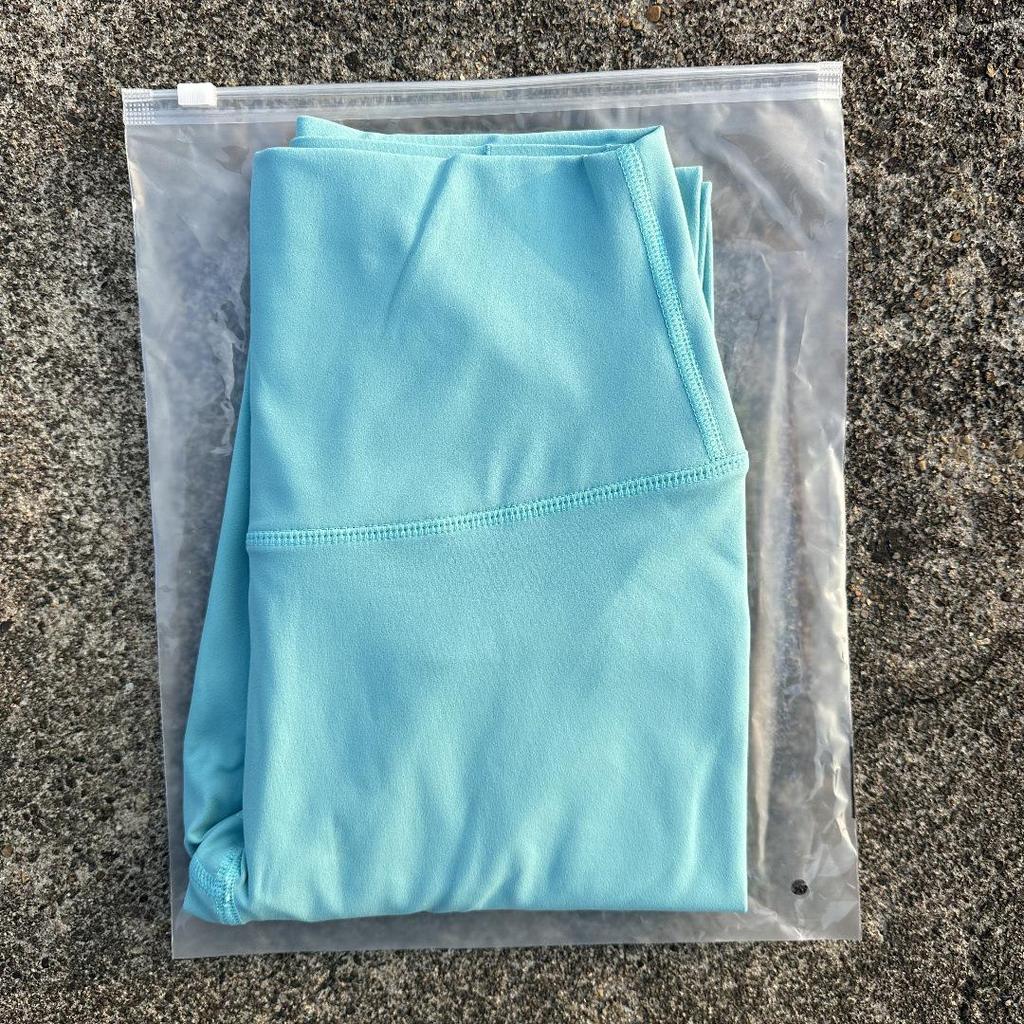 Solid Color High-Waisted Women's Yoga Leggings with Back Pocket – Soft, Elastic, and Peach Bum Enhancing