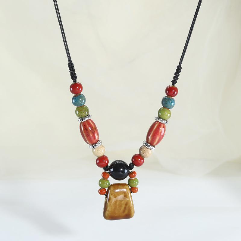 Ceramic axe pendant, long necklace, retro simple and versatile sweater chain.