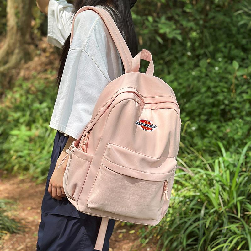 Backpack New large-capacity backpack Junior high school student high-value schoolbag Anti-theft simple student schoolbag