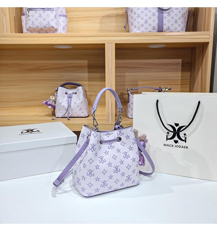 Women's Large Capacity Single Shoulder Bucket Bag with Inner Lining, Compartment Organizer, and Zippered Middle Section.