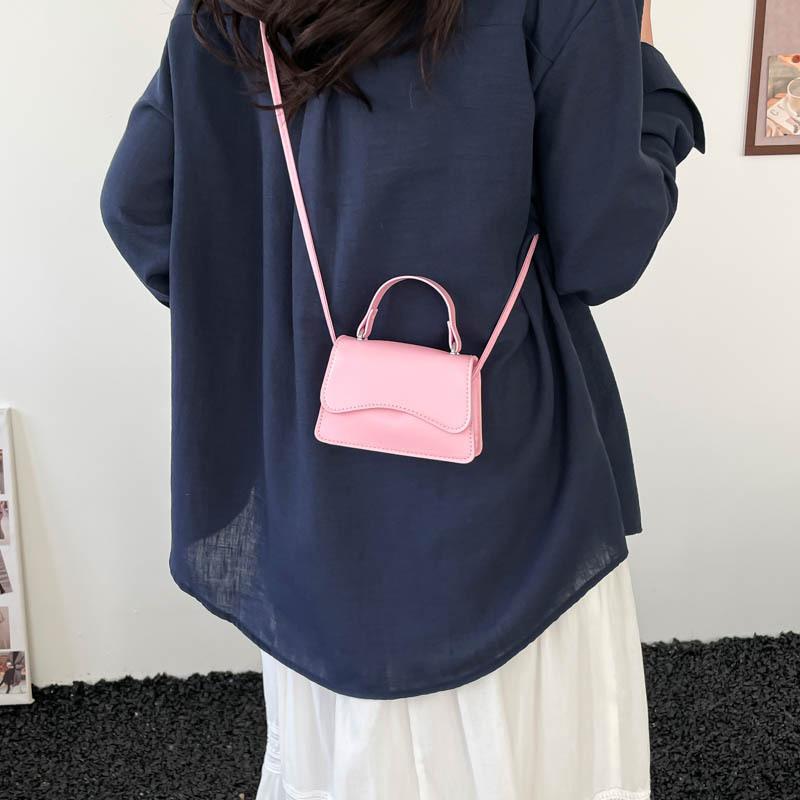 Solid color candy color fashionable retro small square bag women's niche design versatile personality casual senior messenger bag