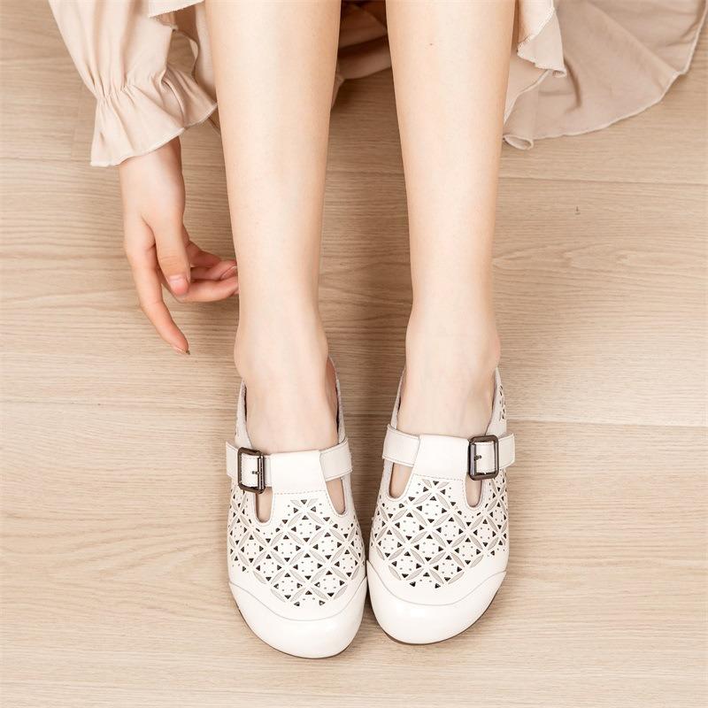 The first layer of cowhide summer hollow bag head women's slippers flat heel soft sole medium and old retro mother shoes genuine leather sandals women