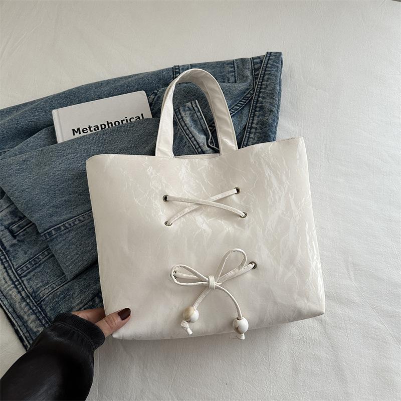 

2025 осень новая мода бант большая вместимость сумка-тоут женская простая повседневная сумка через плечо сумка-подмышка для通勤 белый