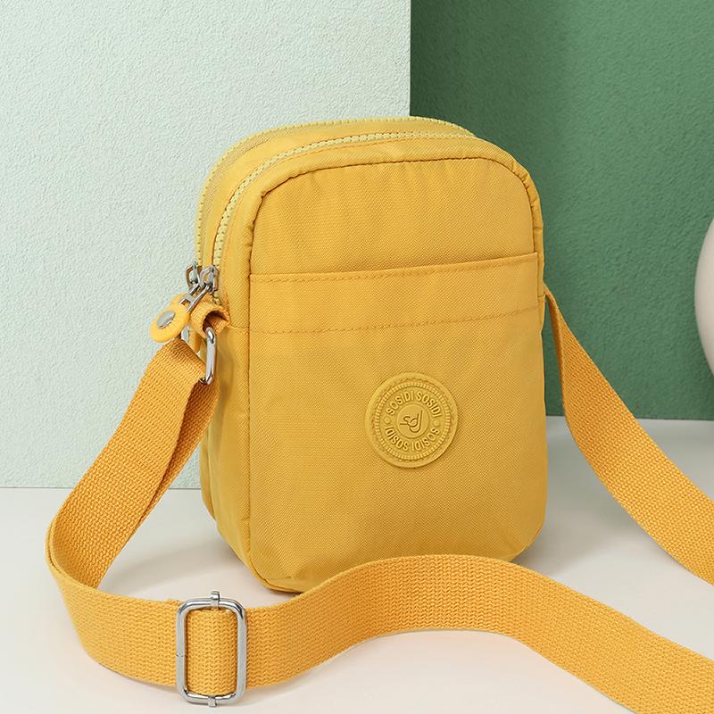 Compact Nylon Crossbody Bag with Double Zipper Closure Adjustable Strap Small Casual Purse for Daily Travel