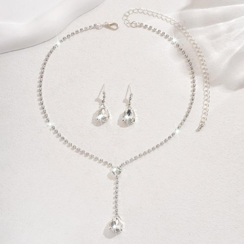 Set da sposa: Set minimalista di collana e orecchini a goccia con diamanti