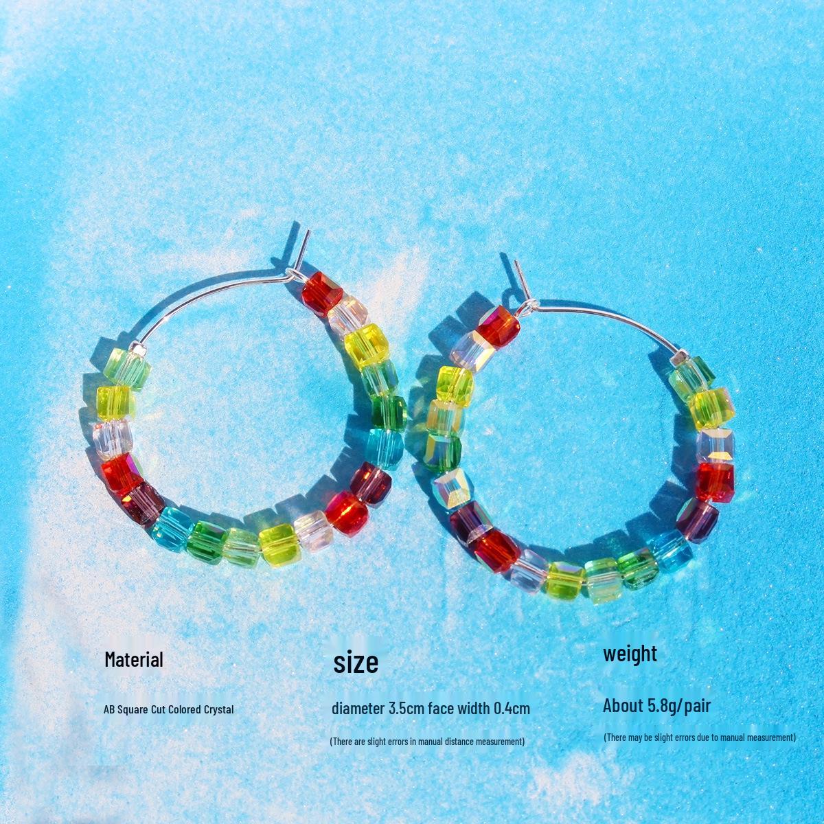 

Набор ожерелья с радужным кристаллом-хранителем и разноцветных серег-колец