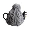 This Smoked Tea Cozy from the Home of Authentic British Tea, Fits 4 Cups (1200ml), Is Made In England from 100% Wool and Cable Knit. The Carefully