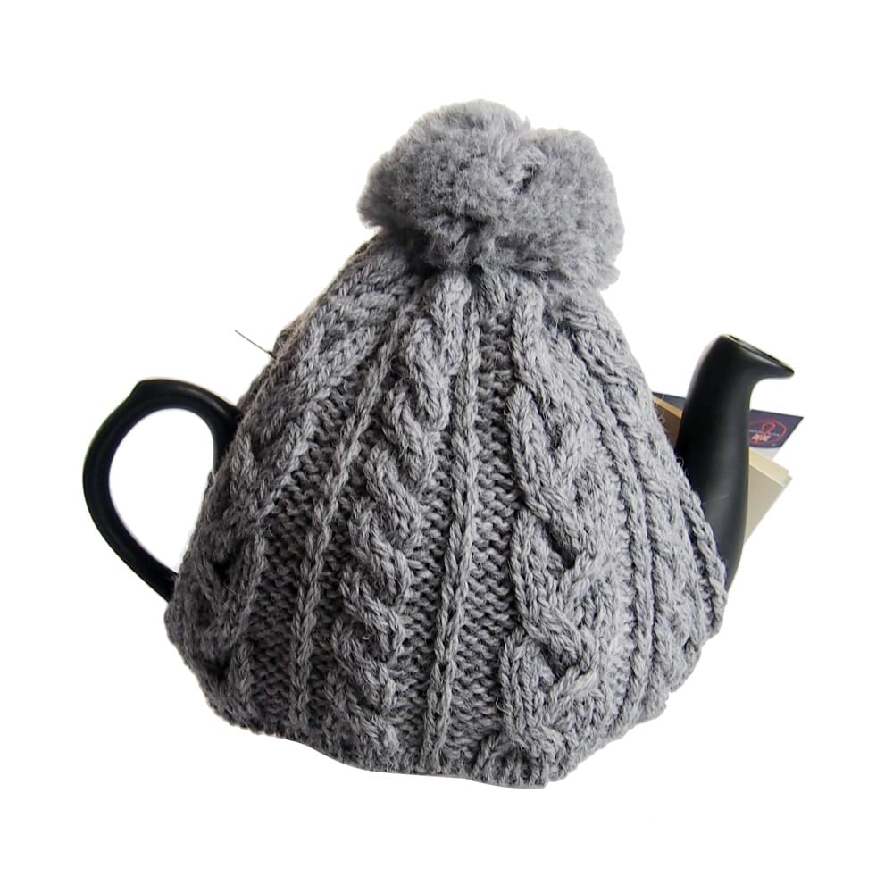 This Smoked Tea Cozy from the Home of Authentic British Tea, Fits 4 Cups (1200ml), Is Made In England from 100% Wool and Cable Knit. The Carefully
