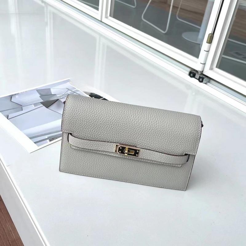 New lychee pattern leather half cover hand grab bag genuine leather women's bag single shoulder underarm bag oblique span bag wholesale