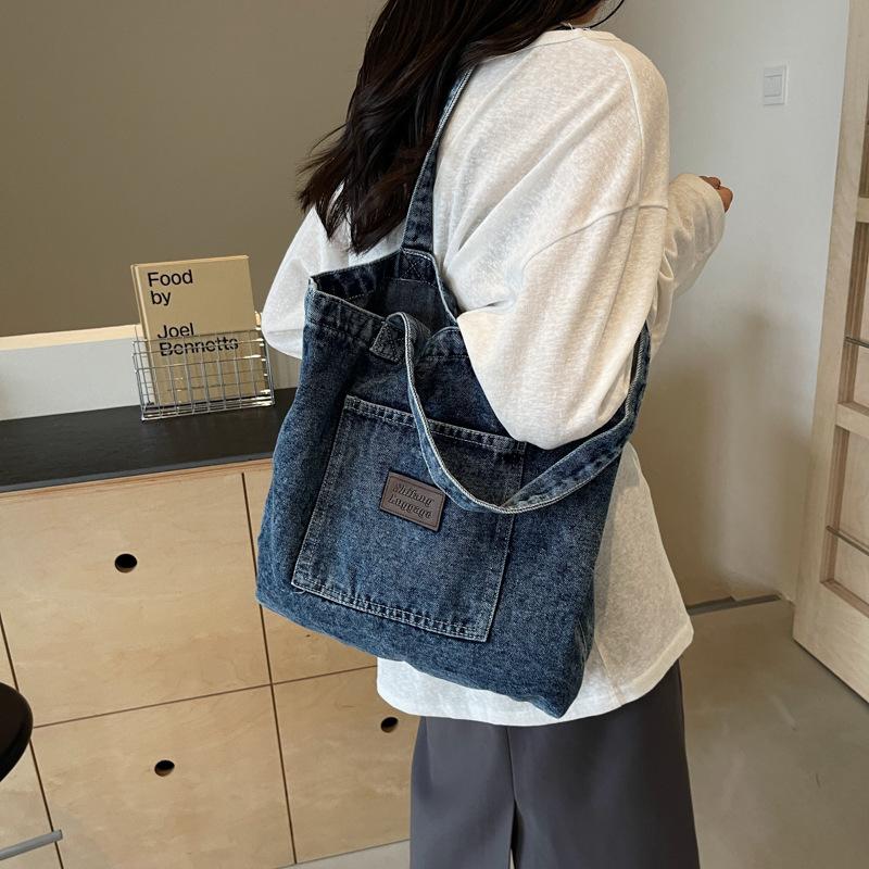 Korean version of casual washed denim bag women's 2025 new fashion canvas pocket literary shoulder bag tote bag
