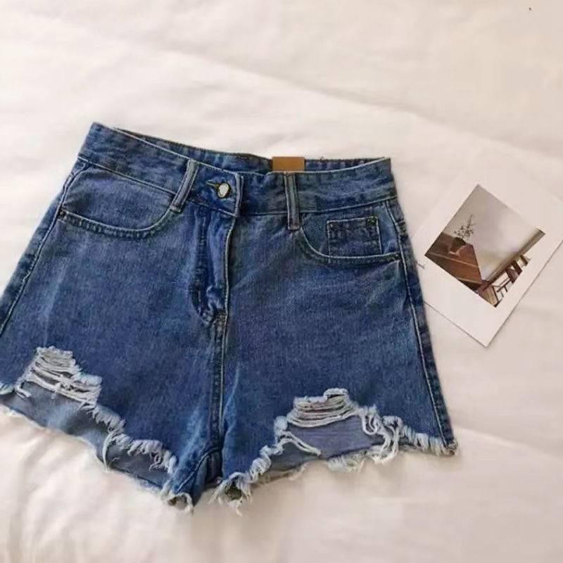 

Вузькі, модні універсальні джинси, жіночі літні тонкі джинси, вільні широкі штани з розбитими дірками, мішковина, тонкі суперкороткі штани А-силуету з високою талією 2XL темно-синього кольору