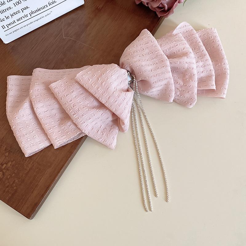 

Заколка-кисточка с бантом, нишевый преувеличенный дизайн, большой объем волос, пружинный зажим, модные милые аксессуары для волос для женщин