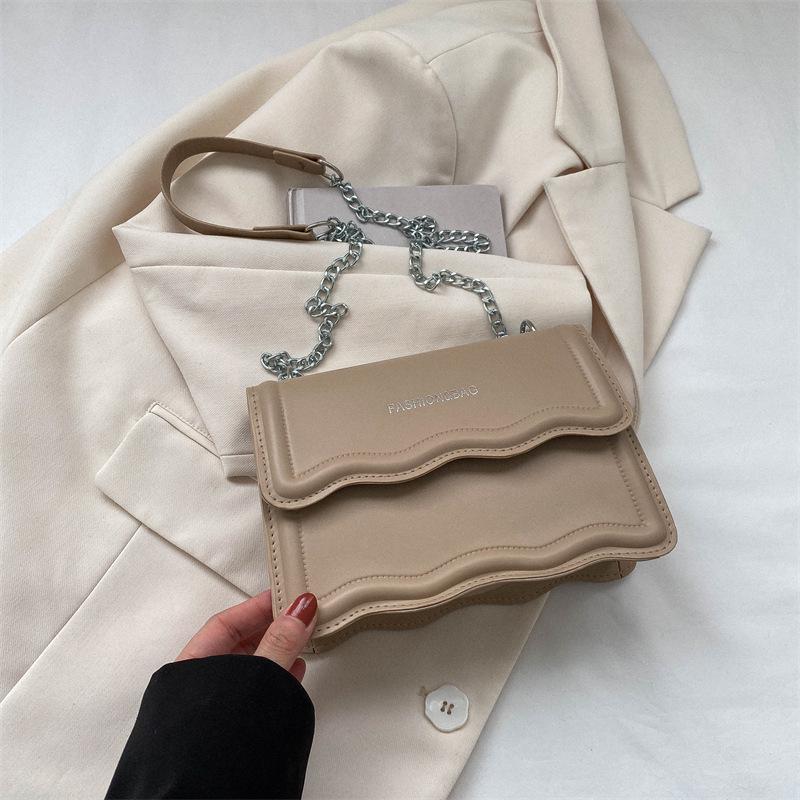 Korean Style Small Square Women's Crossbody Bag - 2025 Solid Color, Wave Pattern, Chain Shoulder, Simple Fashion.