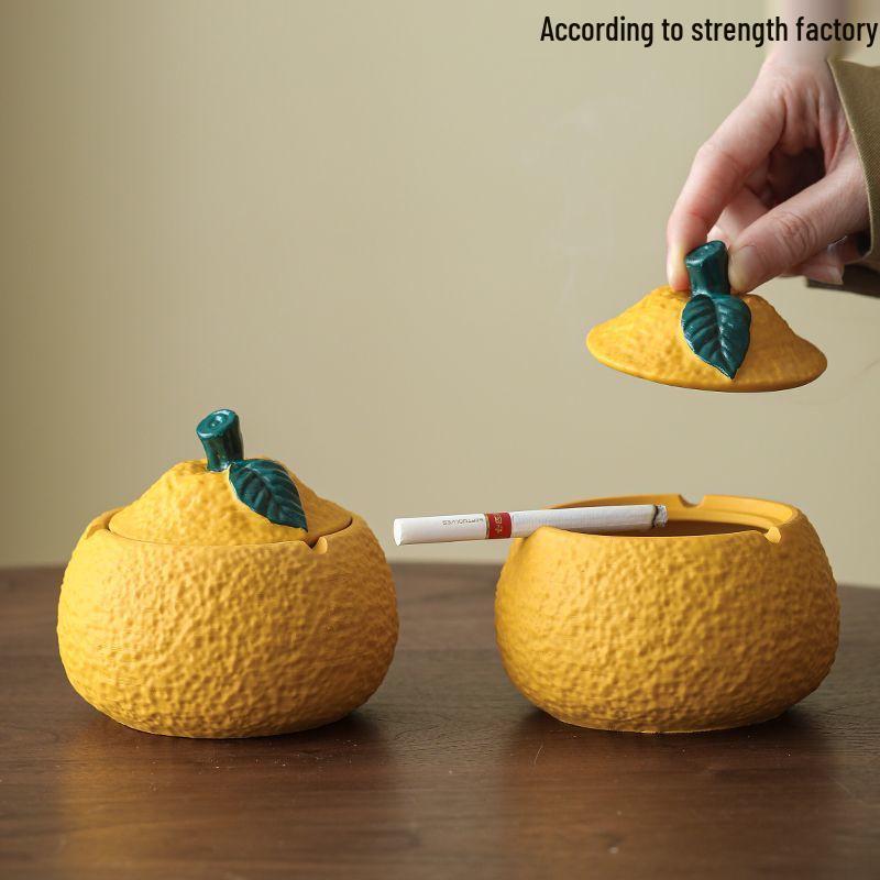 Resin Orange Ashtray with Lid - Stylish, Anti-Fly, High-Value Ornament for Home or Office.