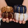 18K Gold-Plated Dopamine Resin Bracelet: European & American Light Luxury Fashion, Versatile Wide Band Elastic Design.