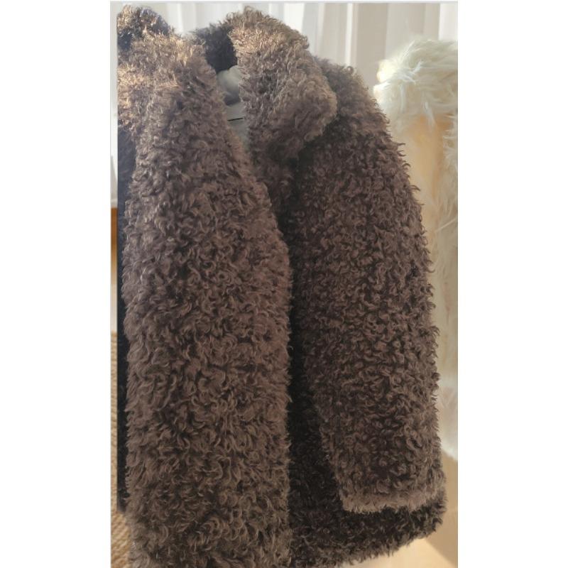 High-end imitation lamb wool coat women's winter new thickened loose design lapel light environmentally friendly fur