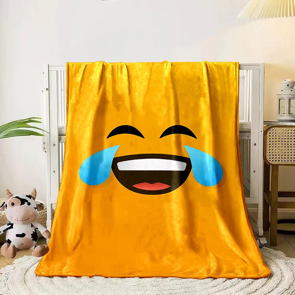A laughing emoji face with tears on a bright yellow background. for all seasons blanket lunch break throw gift 80cm x 120cm