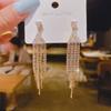 Light luxury high-end sense gold long fringed temperament earrings fashionable atmosphere versatile stud earrings personalized daily earrings