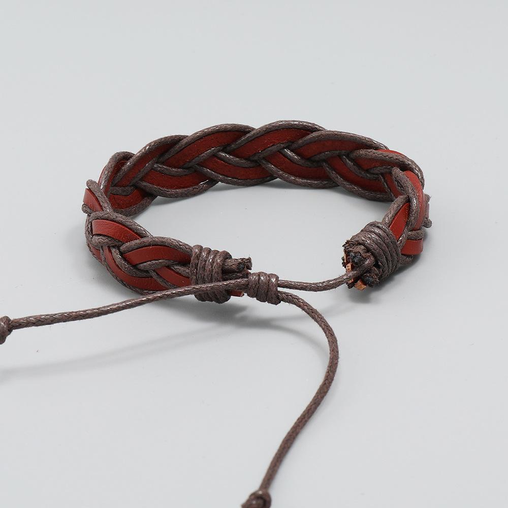 Nytt enkelt håndvevd armbånd kors kuskinnarmbånd kreativt personlig retro armbånd