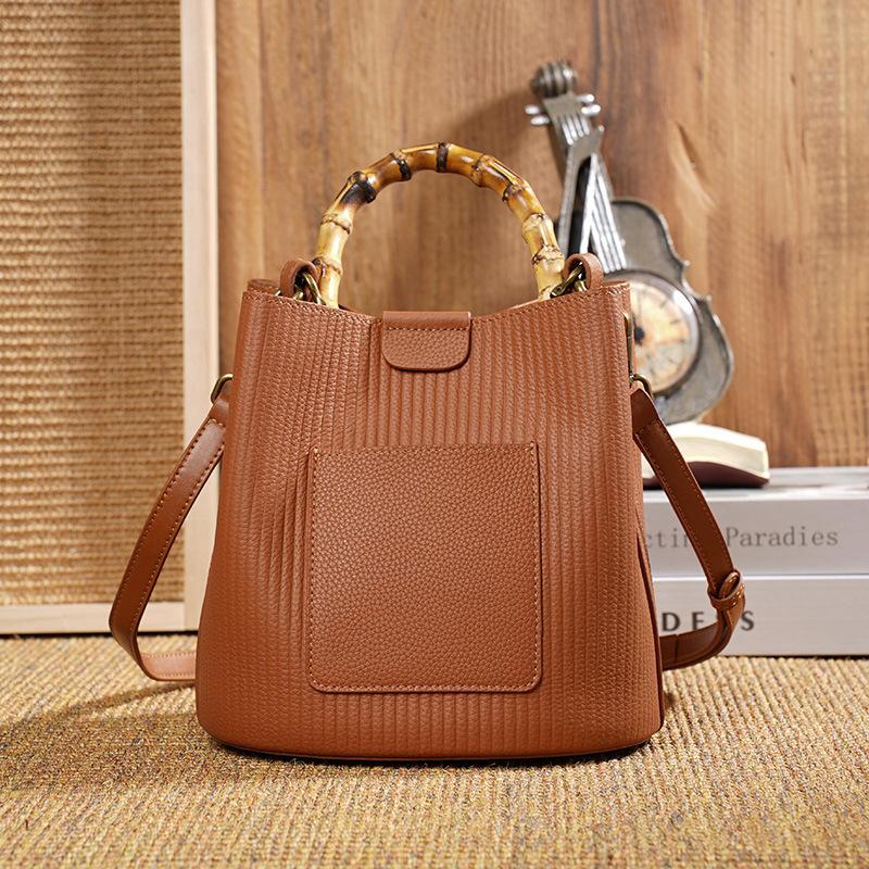 

2025 New Genuine Leather Women Handbags Bamboo Handle Single-shoulder Messenger Bucket Bag Luxury Small Portable Tote Bags коричневий