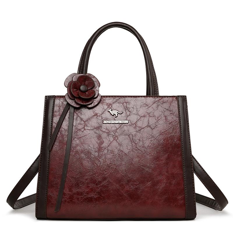 Elegant Faux Leather Tote Bag with Flower Decoration and Adjustable Shoulder Strap