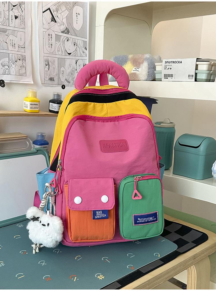 Schoolbag contrasting splicing Internet celebrity backpack female dopamine primary school bag Japanese large capacity burden reduction junior high