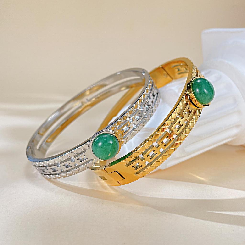 Elegant Titanium Steel Women's Hollow Bangle: European-American Fashion, Light Luxury, and Versatile Accessory