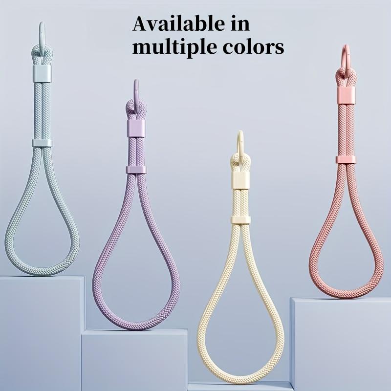 Universal phone wrist strap featuring anti-theft self-locking buckle. Durable anti-drop design, great for outdoor activities.