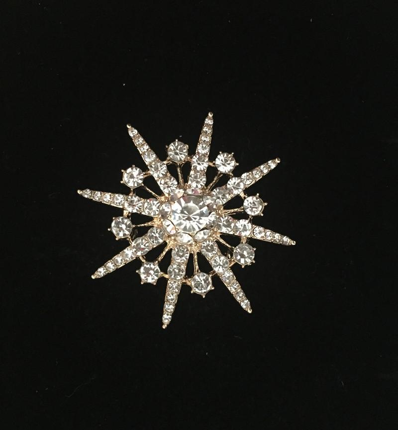 

Універсальна брошка-сніжинка з кристалами - Модний аксесуар для жіночих костюмів